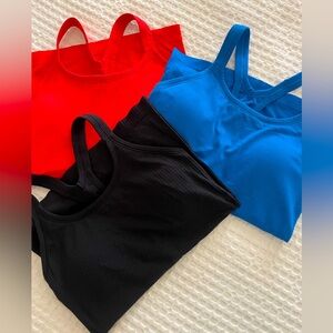 SET OF THREE amazon racerback tank tops
SIZE SMALL